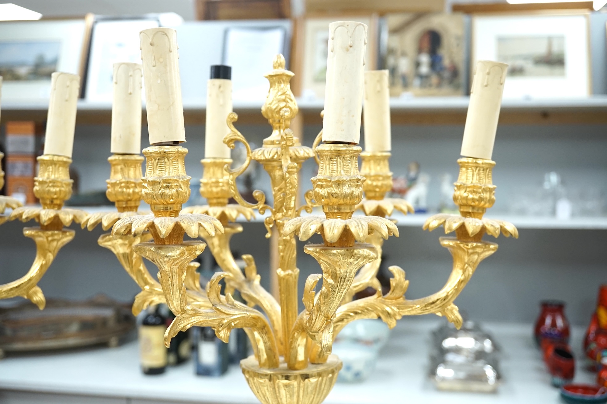 A pair of early 20th century French ormolu figural six branch table lamps, 74cm tall. Condition - good, not tested